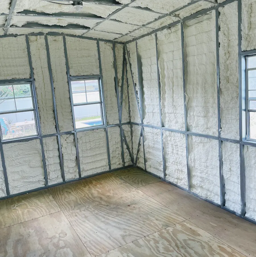 Closed-cell spray foam insulation applied to wall cavities in a residential project in Waverly